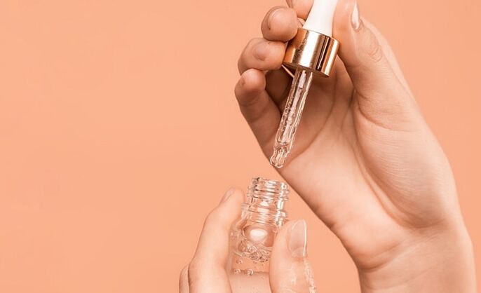 botella de aceite facial